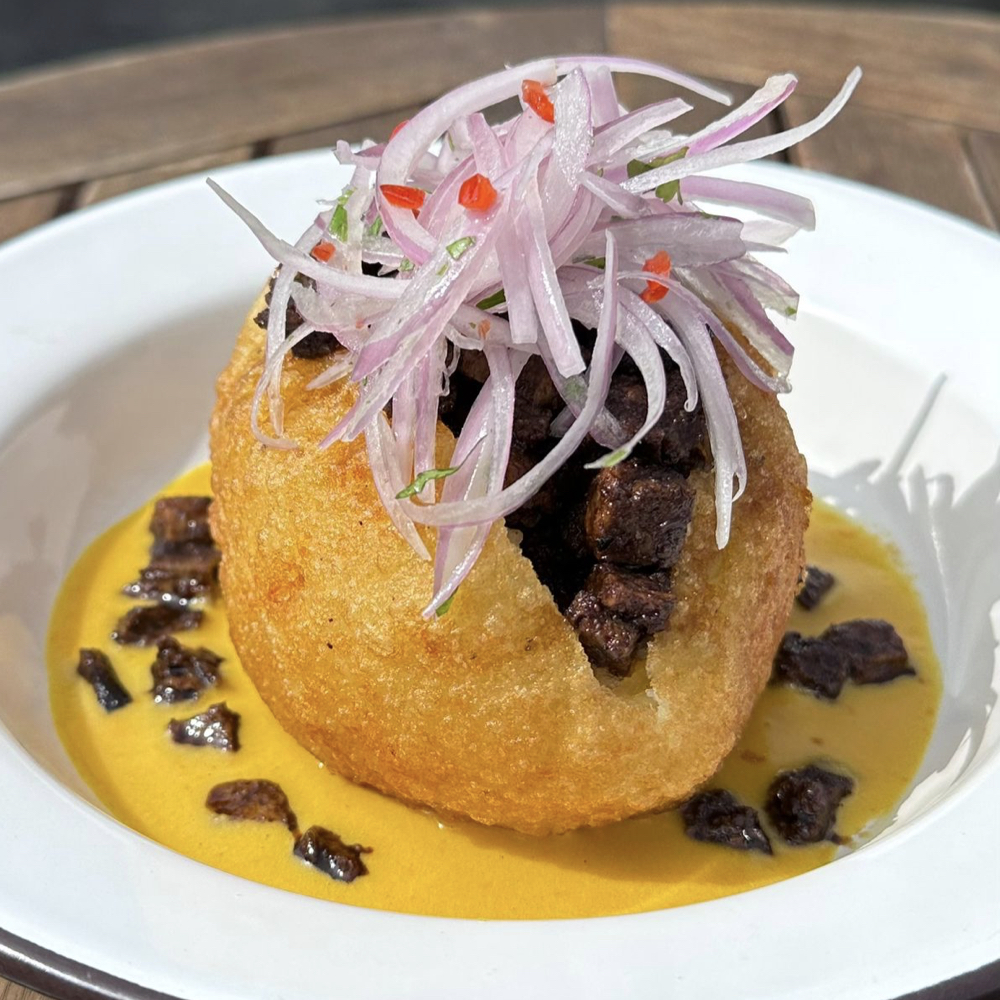 Papa rellena con anticuchos