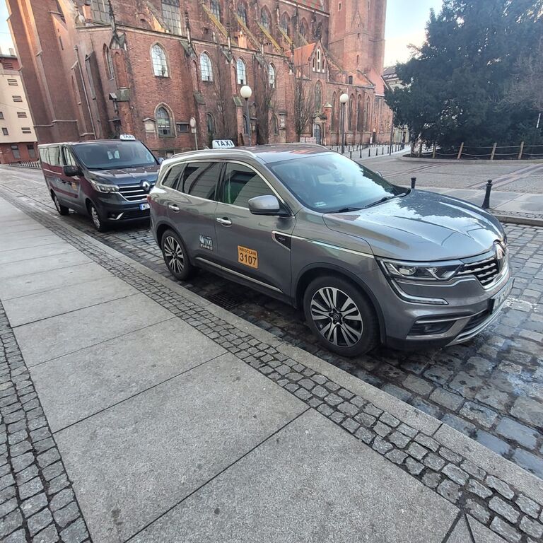 Q TAXI