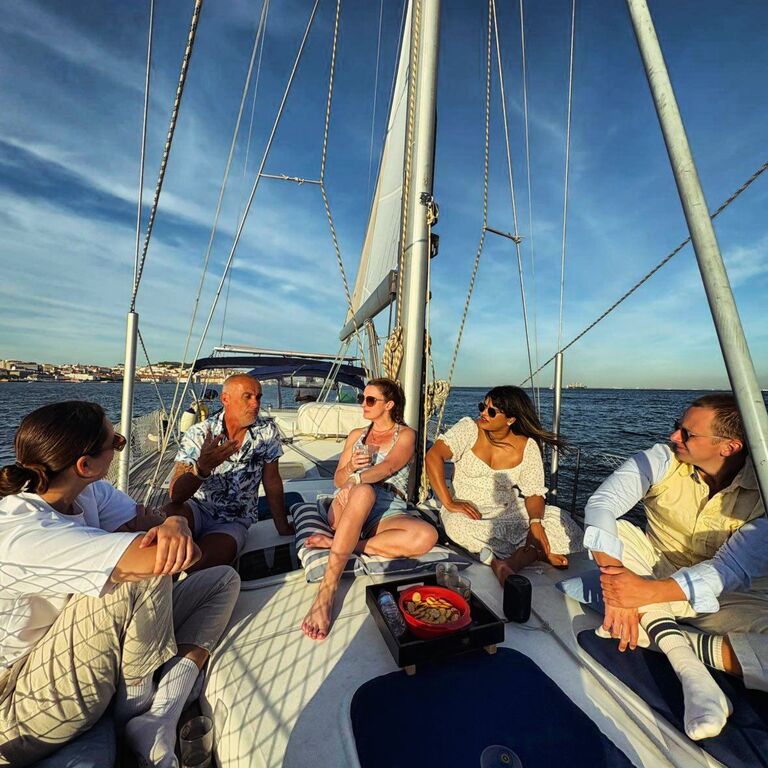 Lisbon Sunset boat tour with wine and local sweets